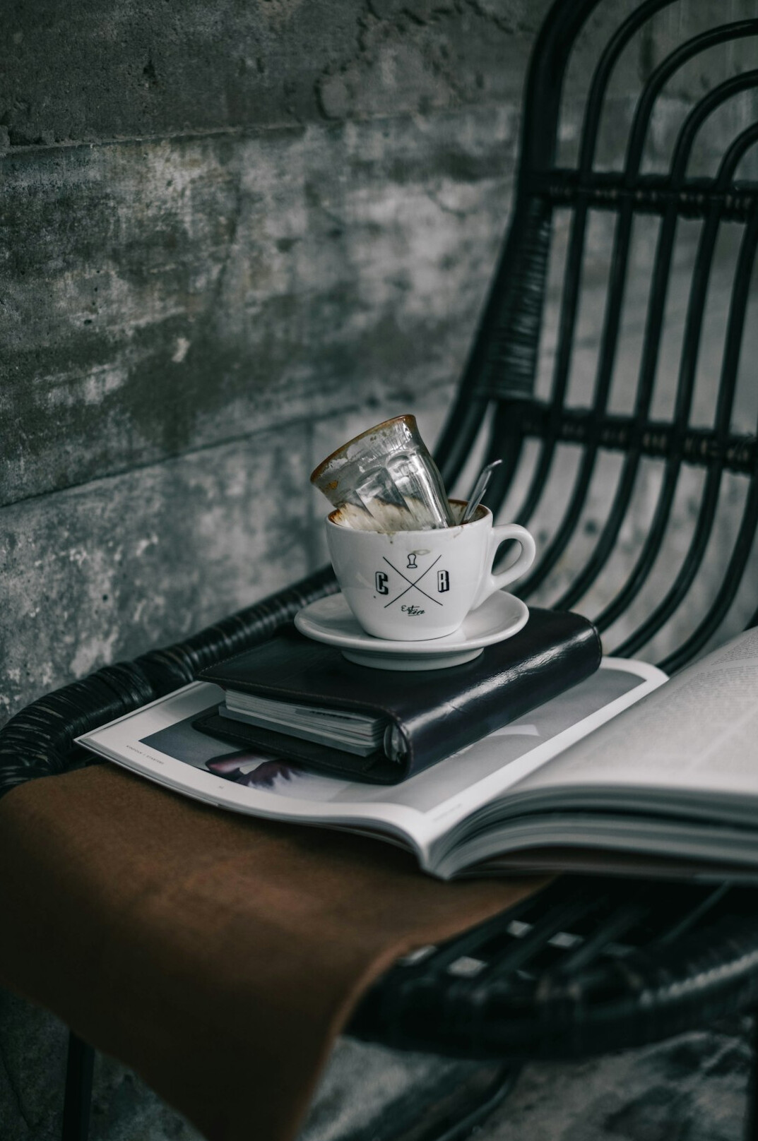 Stack of design magazines with a cup of coffee