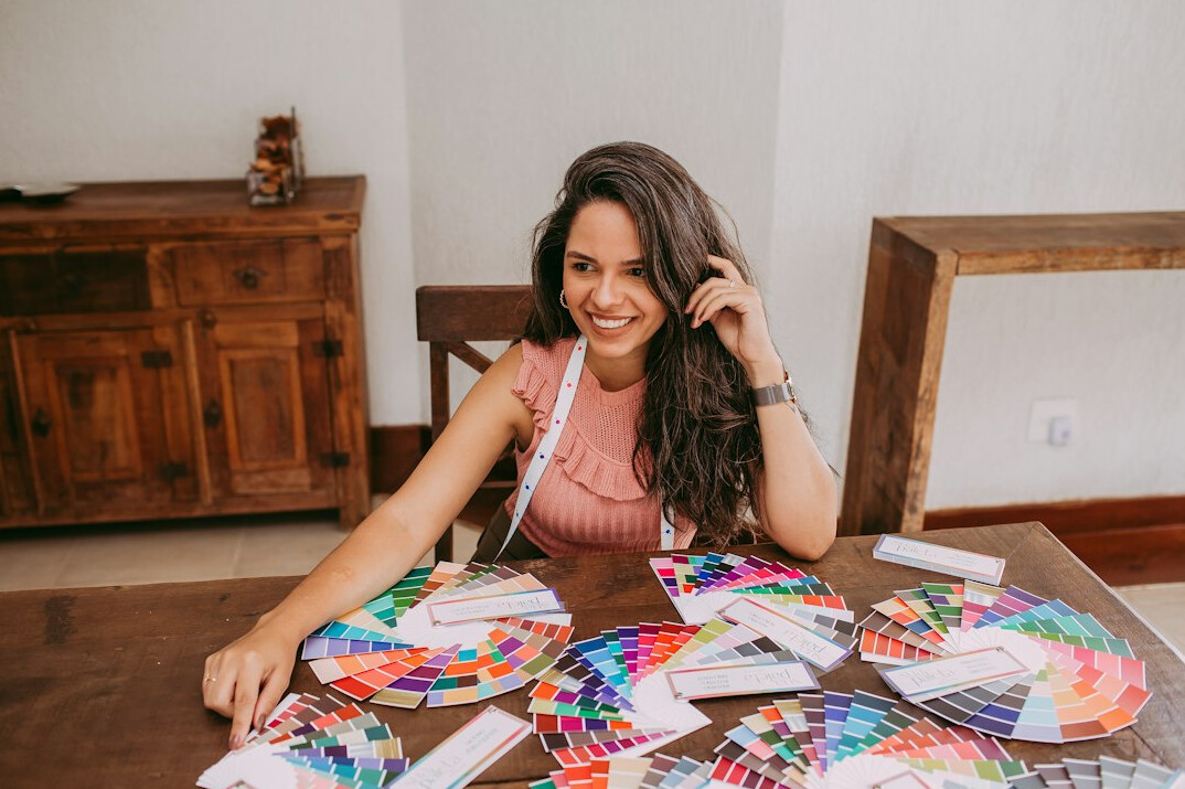 Interior designer arranging fabric swatches and samples