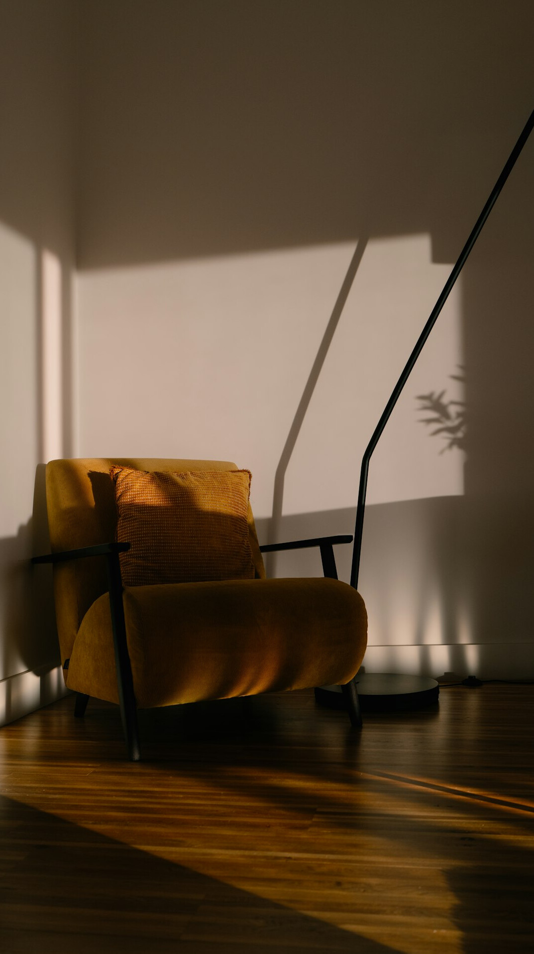 Vintage armchair and side table in warm light